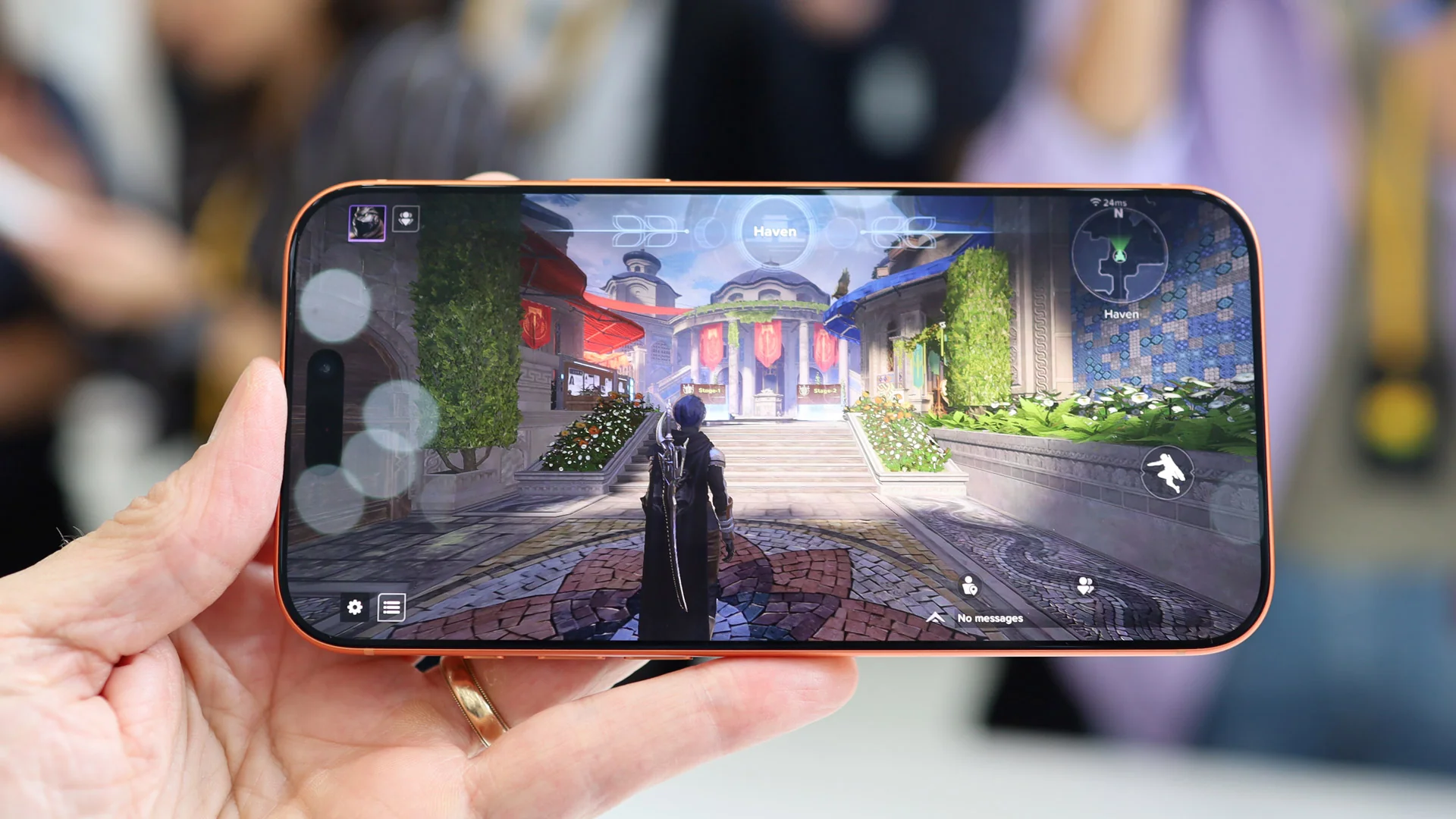 Smartphone iPhone 17 Pro de 2026 ejecutando juego con gráficos de alta fidelidad y trazado de rayos, demostrando el potencial del gaming móvil frente a las consolas tradicionales.